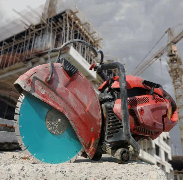 Cutting construction materials with floor saws.
